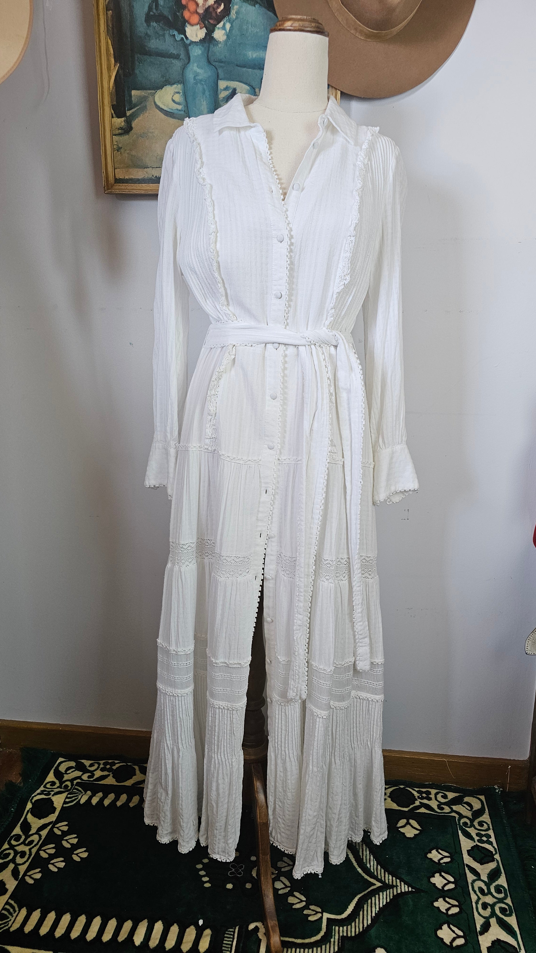 White dress on a mannequin against a white background