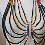 Decorative headpiece with beads on a mannequin head