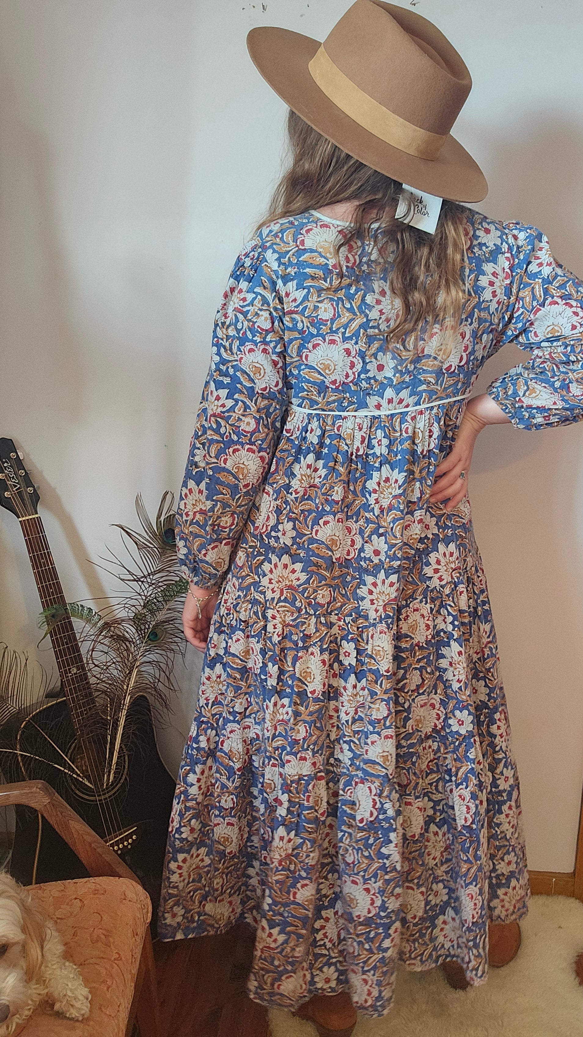 Back view of Property of Zephyr – Sienna Long Layer Dress on model, highlighting relaxed fit and detailed floral print, size small.