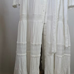 White pleated fabric on a white background