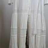 White pleated fabric on a white background