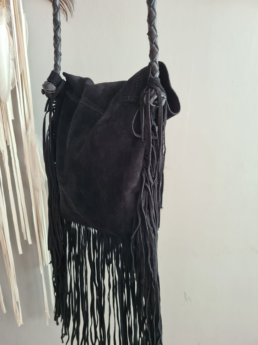 Black suede tassel bag