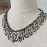 Tribal metal crescent moon choker
