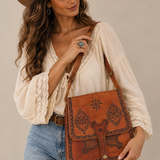Vintage Brown Tooled Leather Saddle Bag