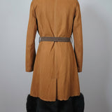 Brown leather jacket with black fur trim on a mannequin against a white background