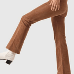 Side view of Rolla’s Dusters Bootcut cords in Tobacco, size 30, highlighting the slim fit through the thigh and soft bootcut flare.