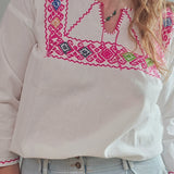 EMBROIDERED COTTON BLOUSE.
