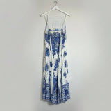 Blue and white floral dress on a white background