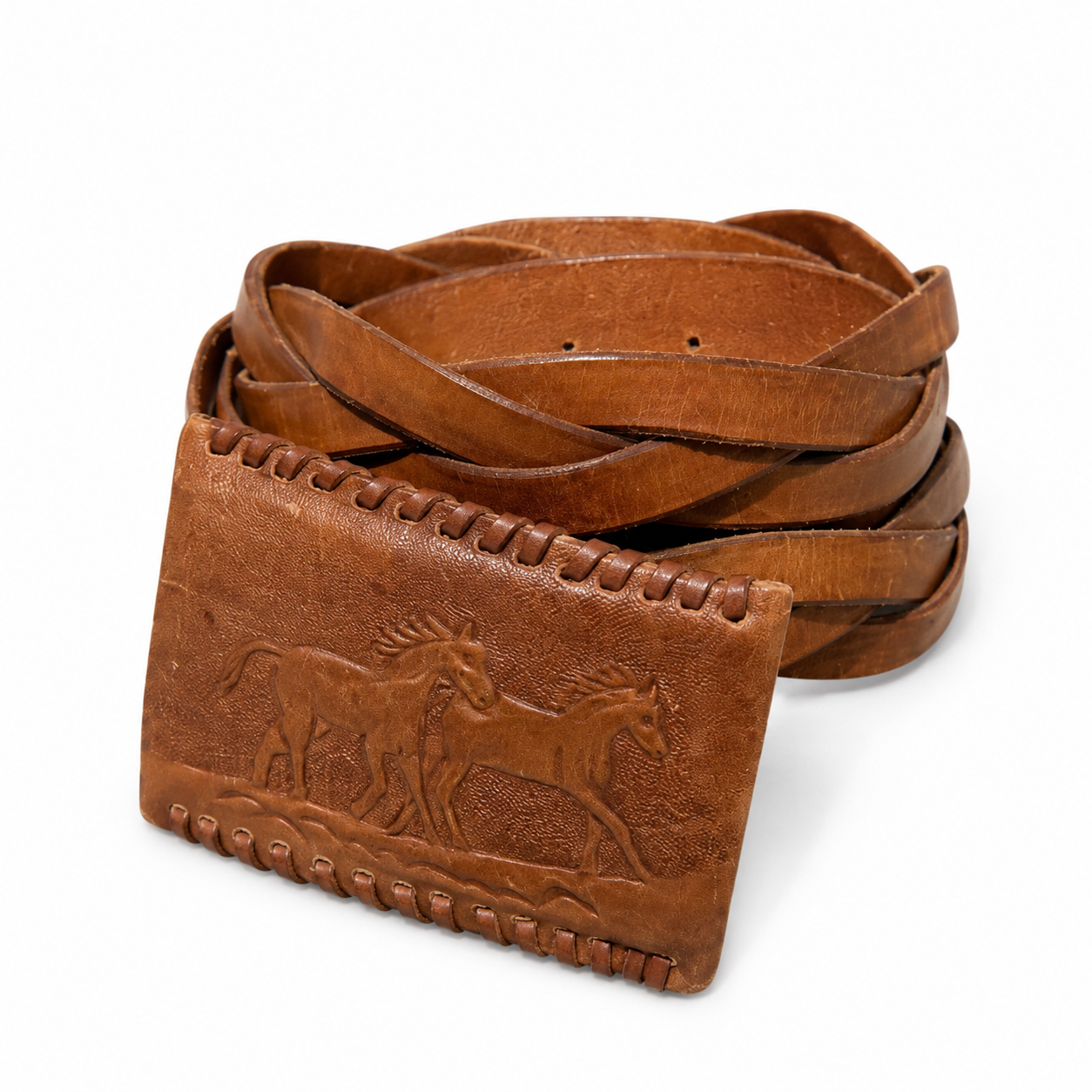 Brown leather belt with embossed design on a white background