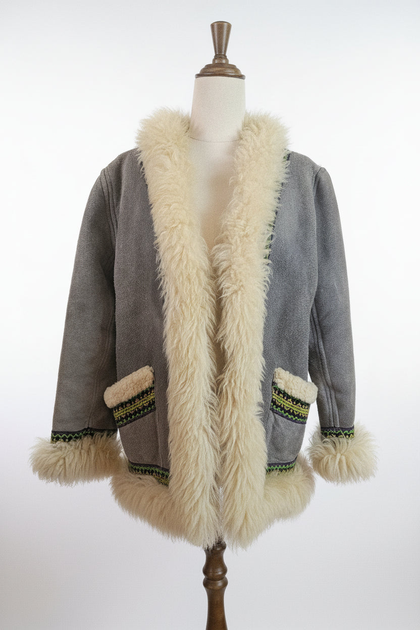 Gray cardigan with beige fur trim on a mannequin against a white background