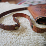 Vintage Brown Tooled Leather Saddle Bag