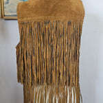 Brown fringed bag on a white background
