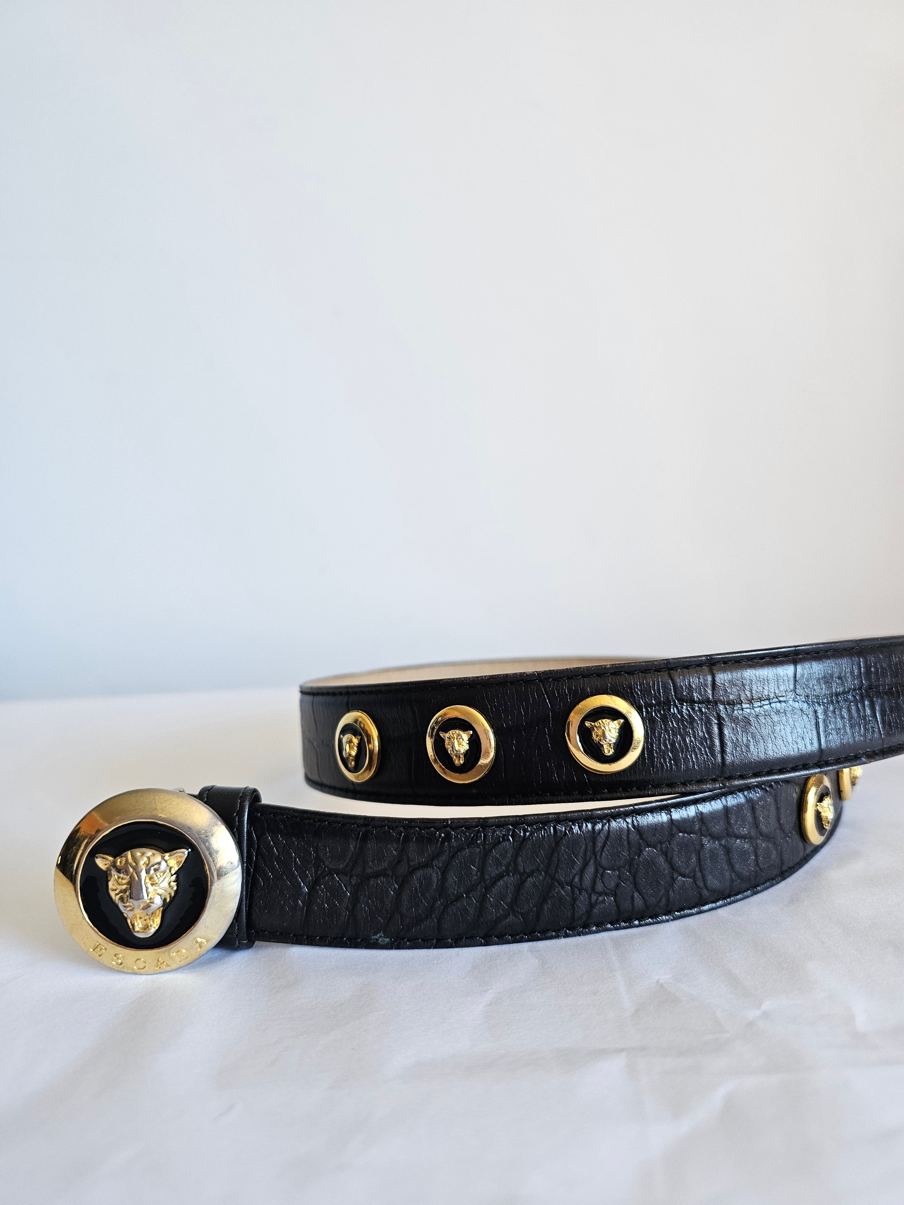 Black leather Escada belt with gold tiger accents 