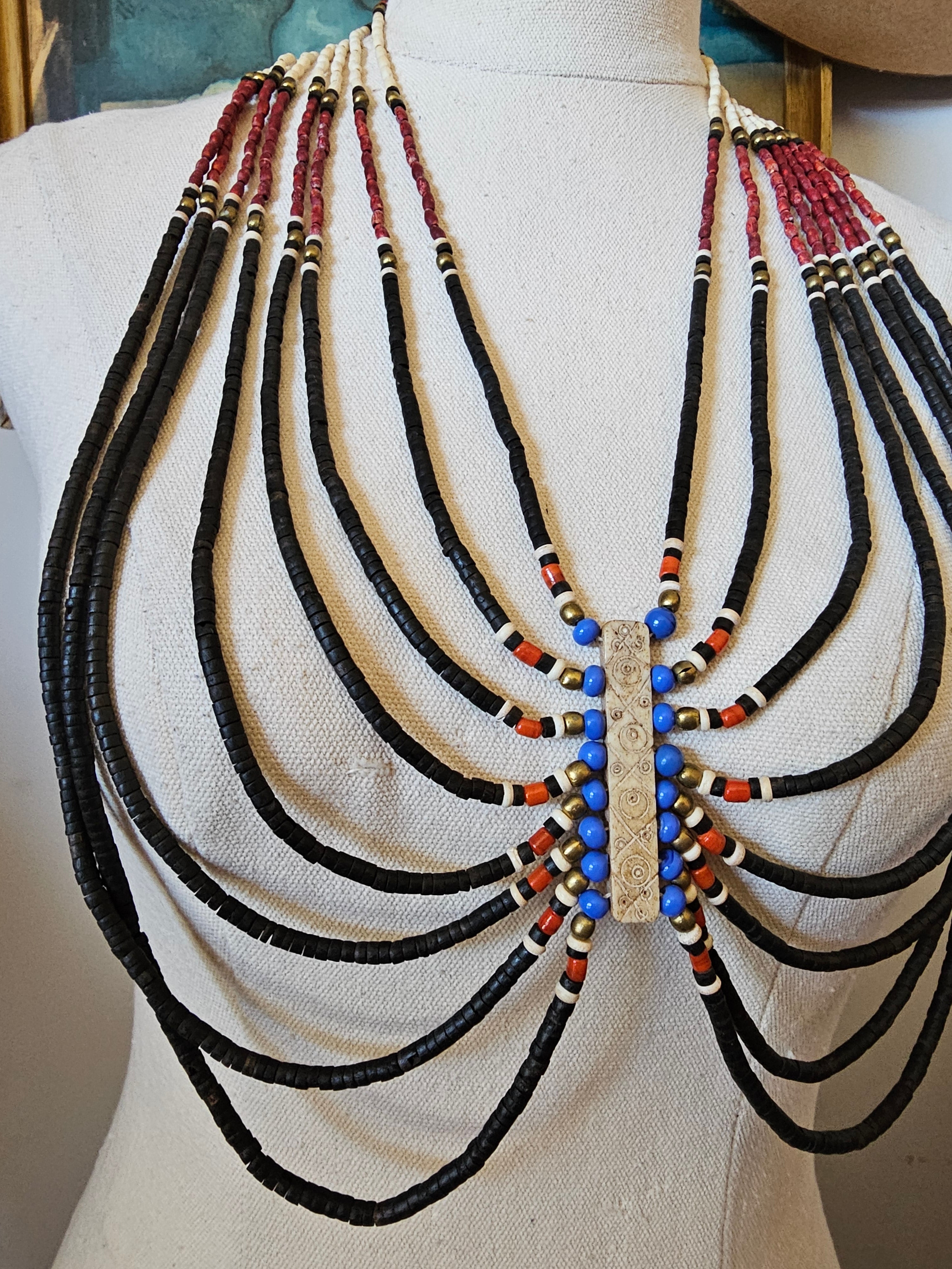 Decorative headpiece with beads on a mannequin head