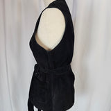 Black velvet headband on a mannequin head against a white background