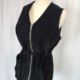 Black dress with zippers on a mannequin against a white background