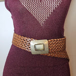 Maroon sweater with a brown belt and metal buckle on a white background