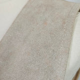 Close-up of a textured fabric surface on a mannequin