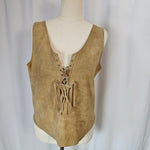 Tan leather saddle with fringes on a mannequin against a neutral background