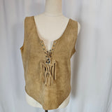 Tan leather saddle with fringes on a mannequin against a neutral background