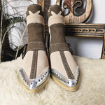 Front view of Western-Style Block Heel Boots – Size 37 showcasing pointed toes, silver-tone caps, and central seam detailing.