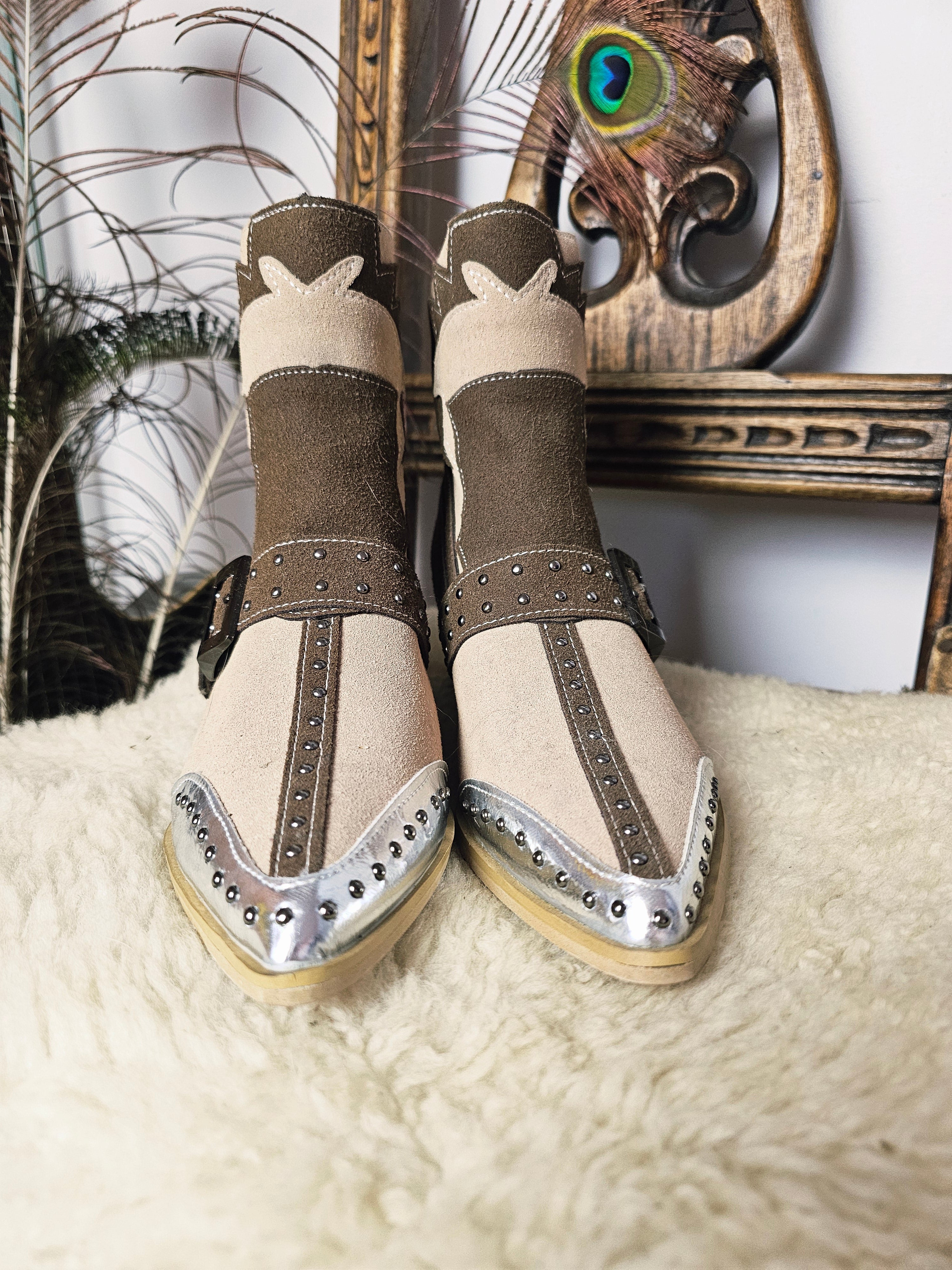 Front view of Western-Style Block Heel Boots – Size 37 showcasing pointed toes, silver-tone caps, and central seam detailing.