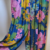 Colorful floral fabric on a white surface