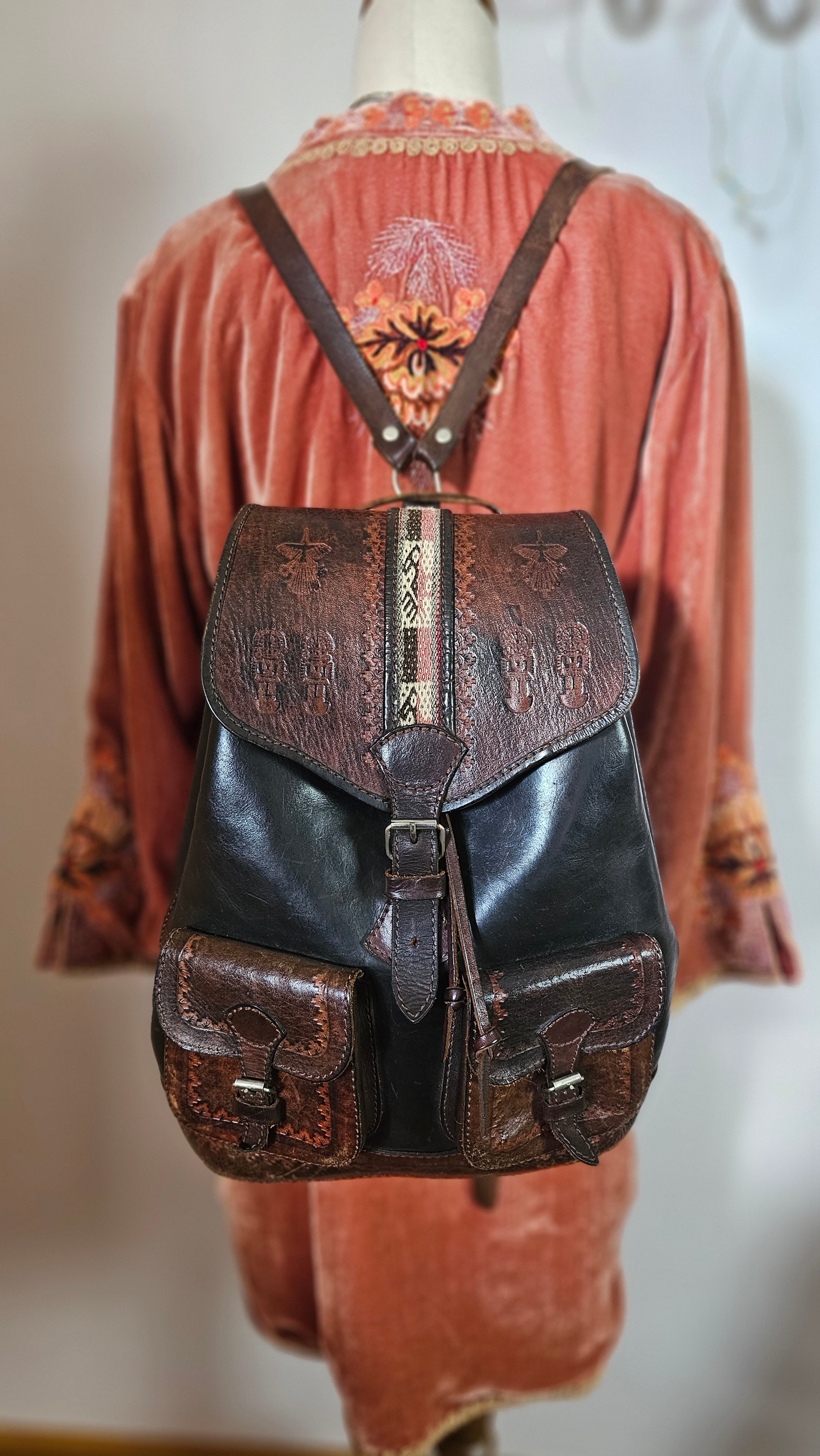 Close-up of a leather bridle on a horse with a blurred background