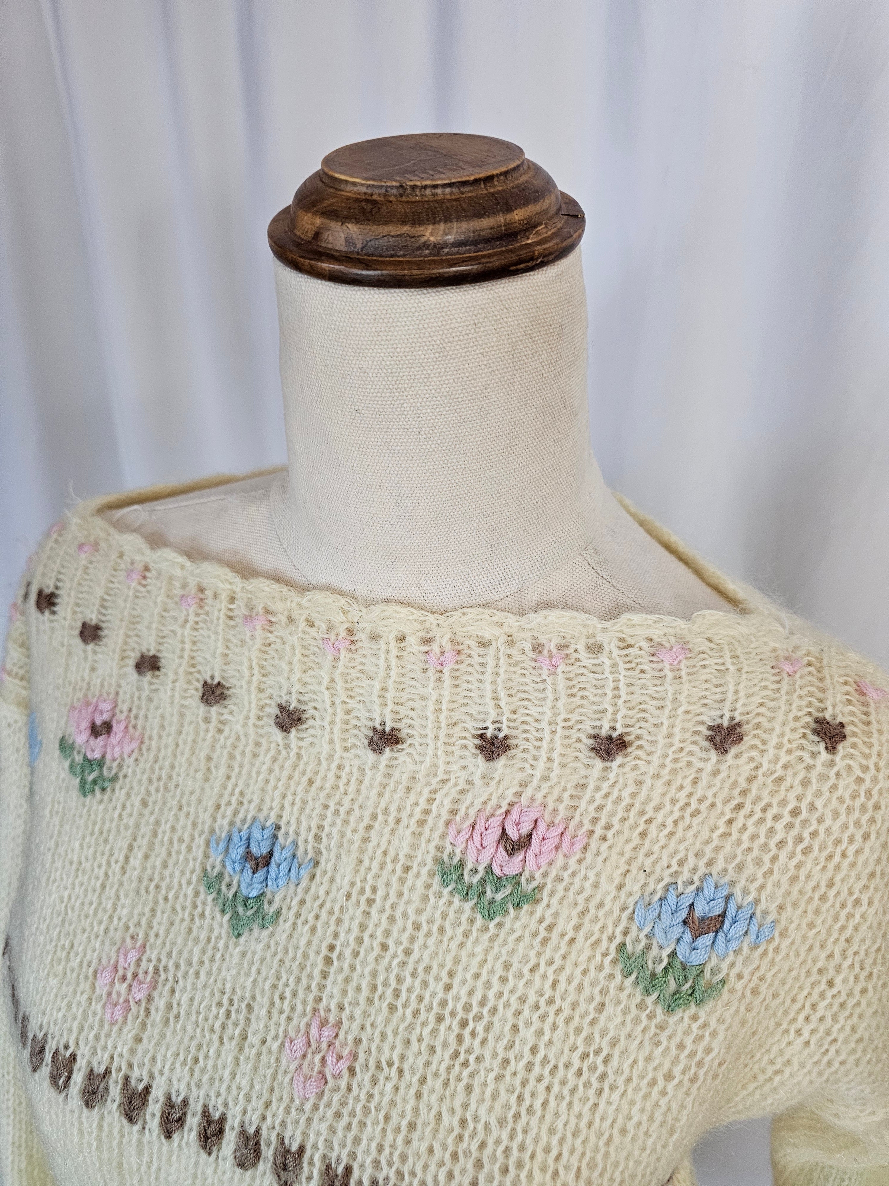 Embroidered fabric on a mannequin bust with floral patterns