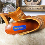 Close-up of Wild Pair branding on insole of Vintage Tan Leather Mules – Size 37, emphasizing quality leather craftsmanship.