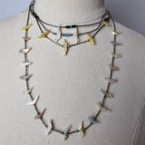 Necklace with barbed wire design on a mannequin bust