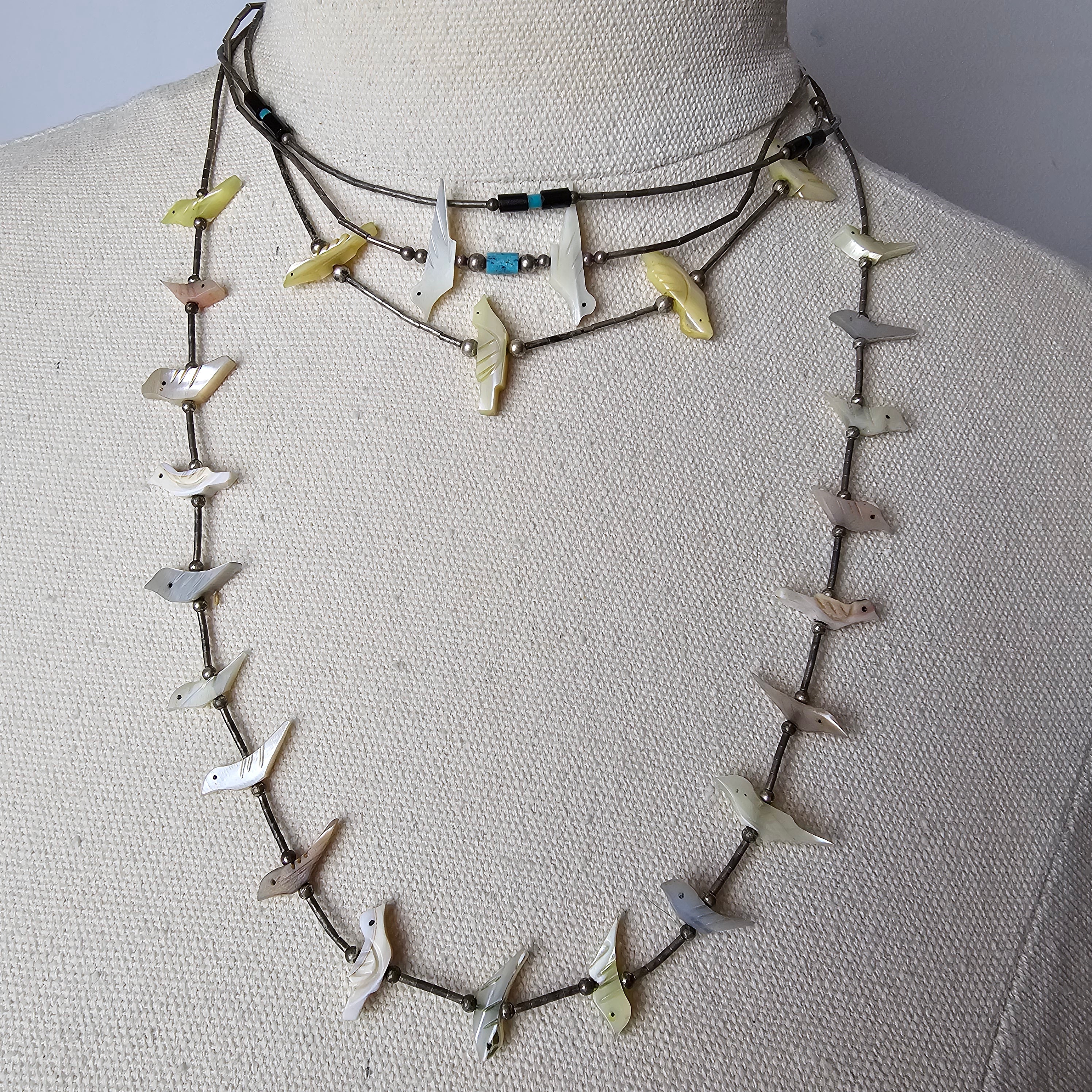 Necklace with barbed wire design on a mannequin bust